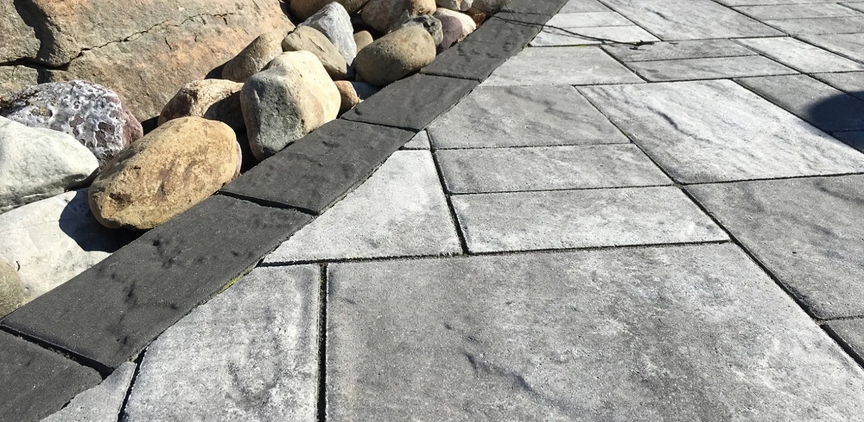 Stone and paver work by Oasis Outdoor Living