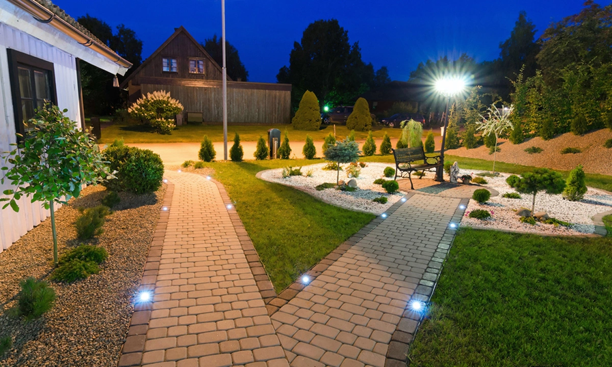 Outdoor lighting and sound installation by Oasis Outdoor Living