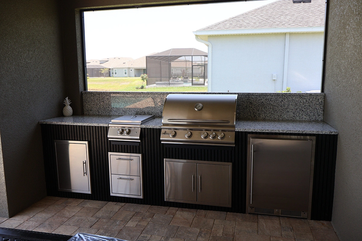 Signature outdoor kitchen island by Oasis Outdoor Living, project photo 11