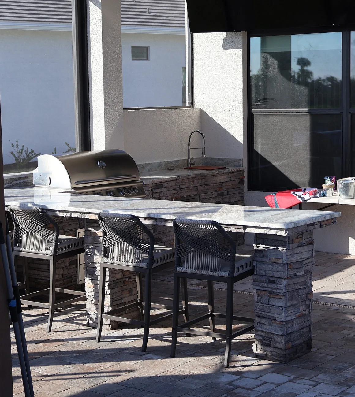 Outdoor kitchen storage and cabinetry by Oasis Outdoor Living